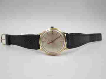 Zenith. 18 karat yellow gold. Automatic movement. Black leather strap. 1960's. Swiss