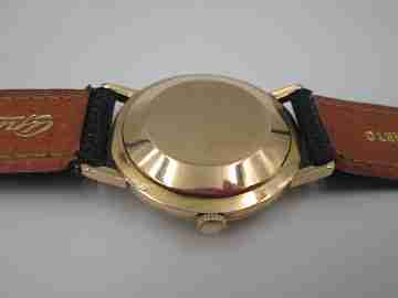 Zenith. 18 karat yellow gold. Automatic movement. Black leather strap. 1960's. Swiss