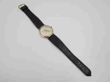Zenith. 18 karat yellow gold. Automatic movement. Black leather strap. 1960's. Swiss