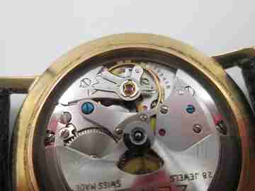 Zenith. 18 karat yellow gold. Automatic movement. Black leather strap. 1960's. Swiss