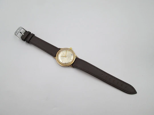 Zenith. 20 microns gold plated and steel. Automatic. Calendar. Strap. 1960's