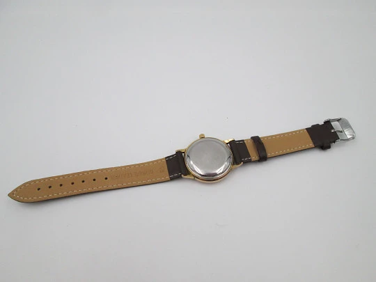 Zenith. 20 microns gold plated and steel. Automatic. Calendar. Strap. 1960's