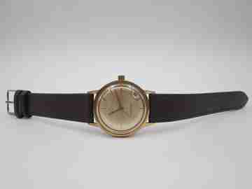 Zenith. 20 microns gold plated and steel. Automatic. Calendar. Strap. 1960's