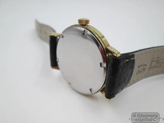Zenith. Manual wind. 1960's. Steel & gold plated. White dial. Swiss