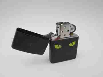 Zippo Cat's Eyes petrol pocket lighter. Chromed metal and black enamel. 2010