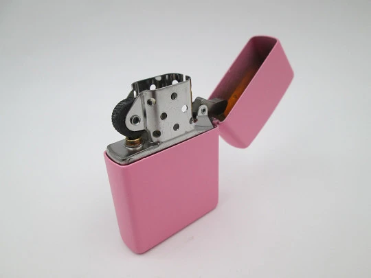 Zippo Playboy petrol pocket lighter. Chromed metal and pink enamel. 2009. USA