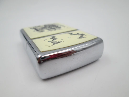 Zippo Scrimshaw. Cromo pulido y acrílico blanco. Diseño faro y galeón. 1992