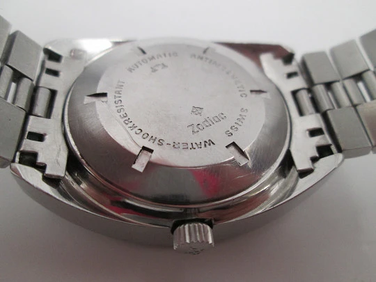 Zodiac. Automatic. Steel. Bitone iridescent dial. Calendar. Bracelet. 1970's