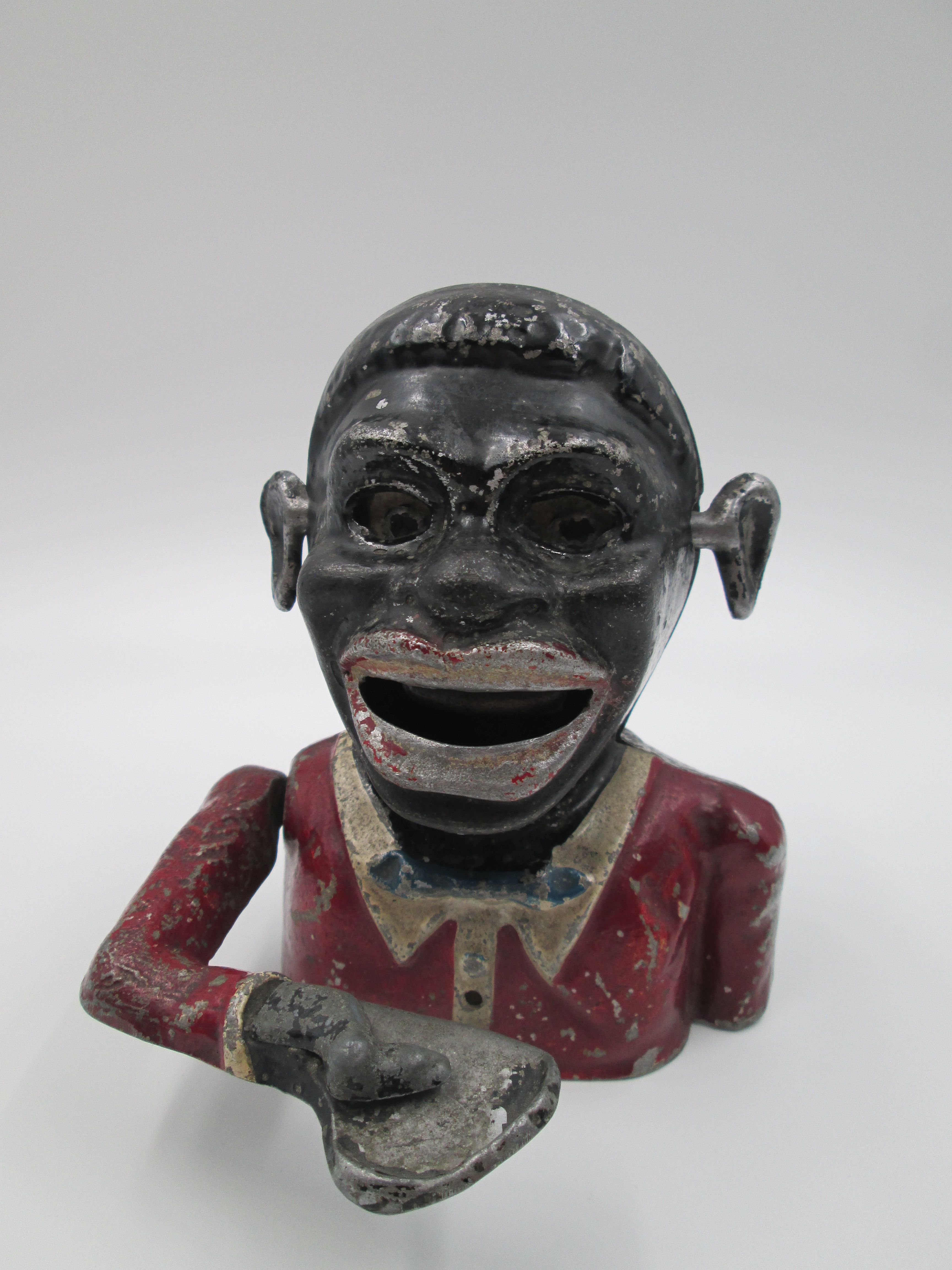 starkie's jolly nigger coin bank cast alloy 1950 england